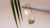 | fluid moon hoop | make a statement with the flowing, organic shape of the Fluid Moon Hoop earring; hand-cut and hammered sheet is suspended from long, triangular ear wires | available in bronze or sterling silver with 14K yellow gold-fill ear wires | #failjewelry