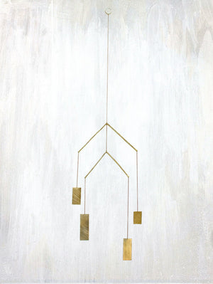 | rectangular 4 piece tiered mobile | Rectangular hand-cut and brushed brass sheet and forged wire with brass chain, perfect for catching light and playing with movement. | #failjewelry