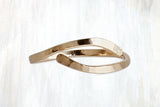 | thin wave ring | minimal with a flowing, graceful style, the Thin Wave ring is perfect for stacking but also stands on its own; forged by hand, this ring features a curved opening, allowing for slight adjustment to fit the desired finger | available in 14K yellow or rose gold-fill, or sterling silver | #failjewelry